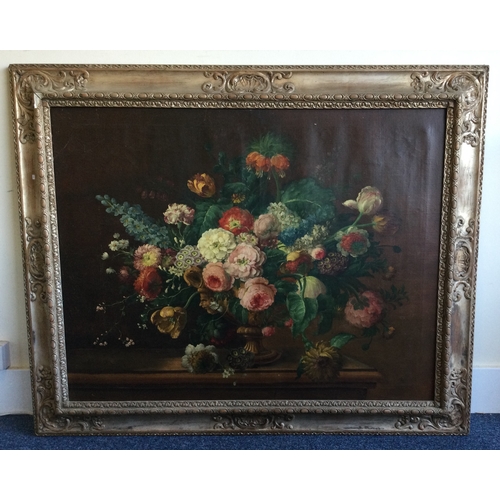 1032 - An oversized gilt framed canvas painting depicting still life with flowers. Apparently unsigned. App... 