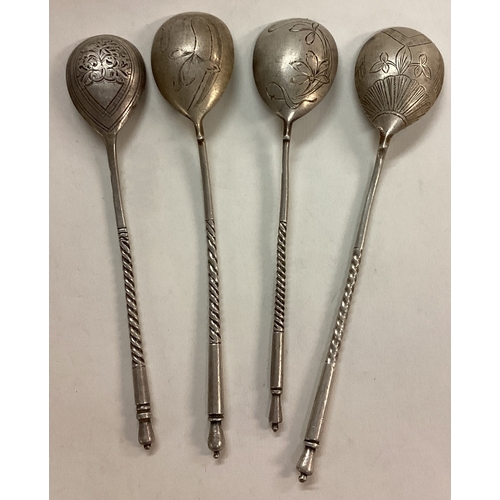 111 - A set of four Russian silver spoons. Circa 1900. Approx. 60 grams. Est. £50 - 80.