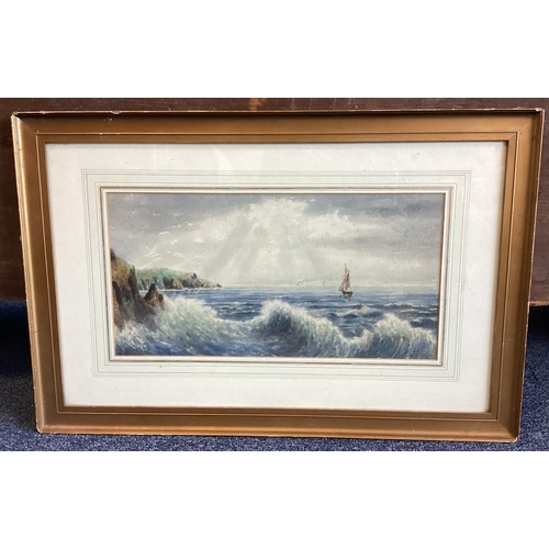 1119 - E G MORRIS: A gilt framed and glazed watercolour depicting a coastal scene with sailing boat. Signed... 