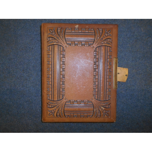 1151 - A late Victorian leather photograph album containing approximately 100 various family portraits. Est... 