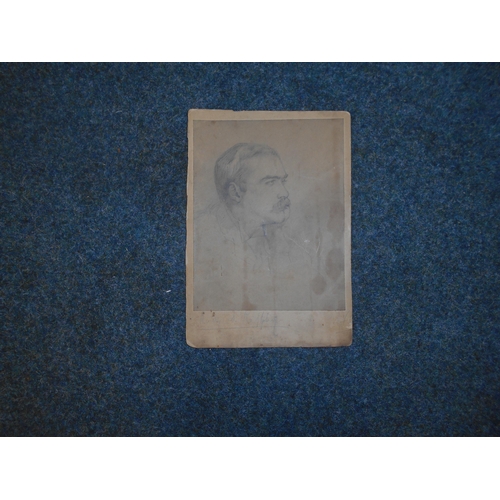 1163 - BOOKS: RUDYARD KIPLING: A faintly signed photograph reproduction of a drawing of Rudyard Kipling. Es... 