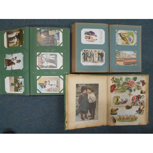 1170 - Two postcard albums together with a loose bag of mostly early 20th Century postcards, and a scrapboo... 