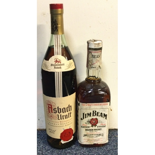 1197 - A 1 litre bottle of Asbrach Uralt German Brandy together with a 750 ml bottle of Jim Beam Kentucky S... 