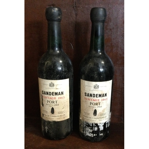 1216 - Two x bottles of Sandeman Vintage 1963 Port. Bottled 1965. Est. £20 - £30.