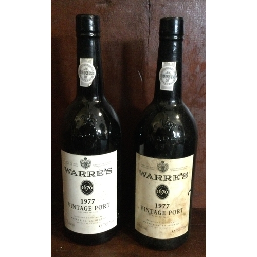 1220 - Two x bottles of 75cl Warre's 1977 Vintage Port. Bottled 1979. £200 - £300.