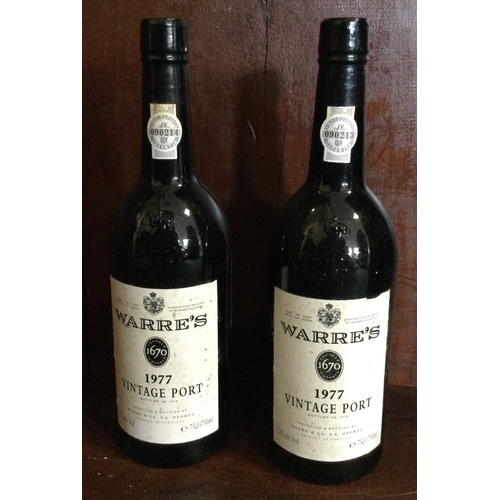 1221 - Two x bottles of 75cl Warre's 1977 Vintage Port. Bottled 1979. £200 - £300.