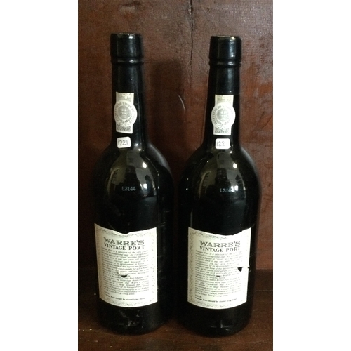 1221 - Two x bottles of 75cl Warre's 1977 Vintage Port. Bottled 1979. £200 - £300.