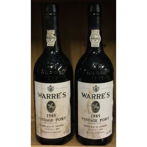 1228 - Two x 75cl bottles of Warre's 1985 Vintage Port. Bottled 1987. Est. £150 - £200.