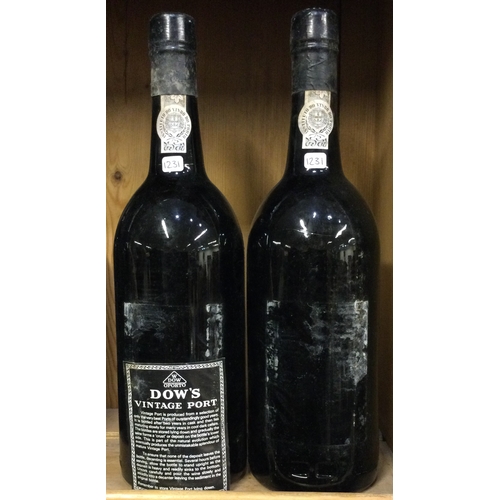 1231 - Two x 75cl bottles of Dow's 1985 Vintage Port. Bottled 1987. Est. £20 - £30.