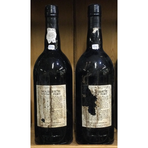 1238 - Two x 75cl bottles of Warre's 1991 Vintage Port. Bottled 1993. Est. £150 - £200.