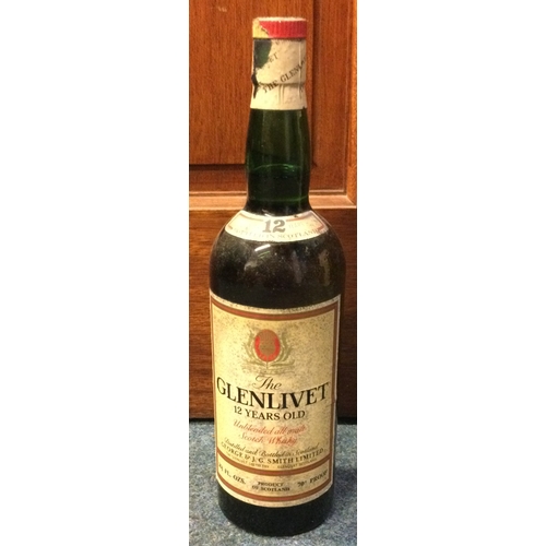 1264 - A 1980's 26 2/3 fl ozs bottle of Glenlivet 12 Years Old Unblended all malt Scotch Whisky. Est. £50 -... 