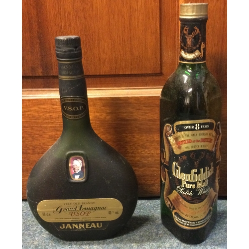 1267 - A 68 cl bottle of Janneau Very Old Brandy Grand Armagnac VSOP, together with a 26 2/3 fl. ozs bottle... 