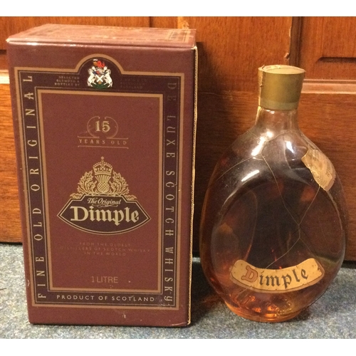 1270 - A boxed 1 litre bottle of '15 Years Old' Dimple Blended Scotch Whisky together with a 26 2/3 bottle ... 