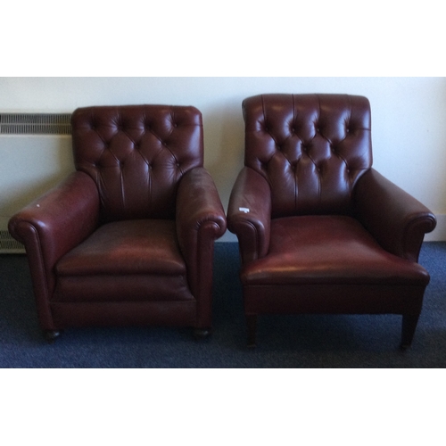 1307 - A good matched pair of button back smokers chairs. Est. £50 - £80.