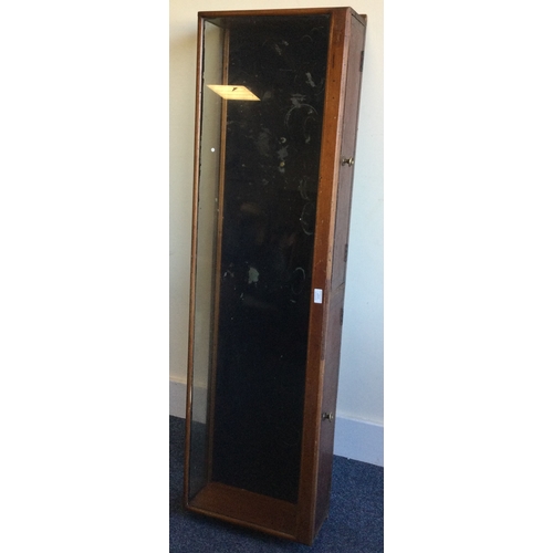 1317 - A good mahogany and glass mounted jewellery cabinet. Est. £30 - £50.