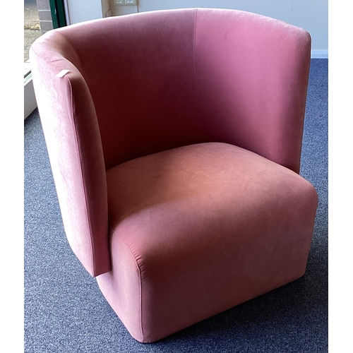 1323 - A stylish Arts and Crafts armchair in pink ground. Est. £50 - £80.