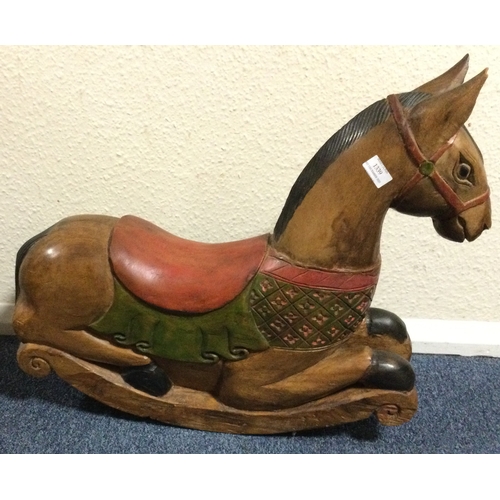 1339 - A Continental painted rocking horse. Est. £40 - £60.