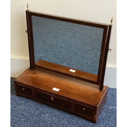 1351 - A mahogany three drawer toilet mirror. Est. £50 - £80.