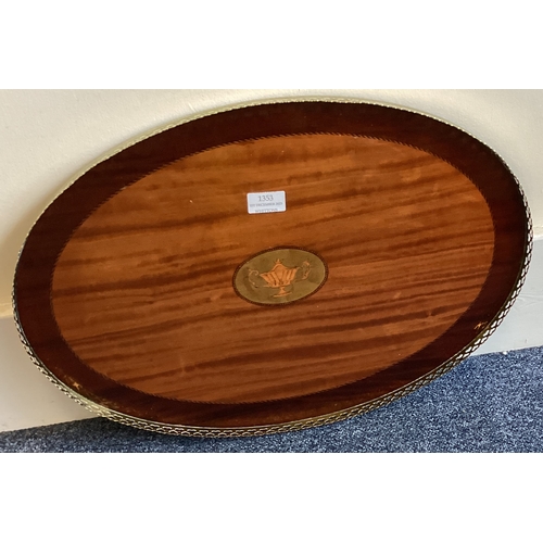 1353 - An attractive Antique oval tea tray. Est. £40 - £60.