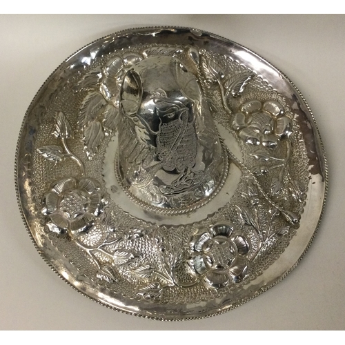 148 - A large Mexican silver sombrero. Approx. 410 grams. Est. £250 - £300.