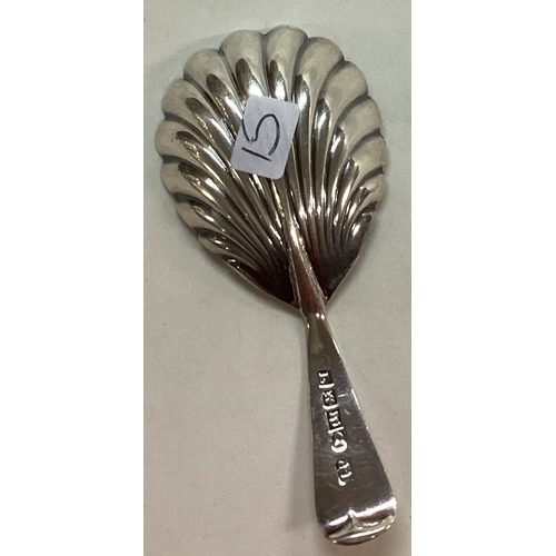 15 - EXETER: A Georgian silver fluted caddy spoon. 1832. By Isaac Parkin. Approx. 12 grams. Est. £50 - £8... 