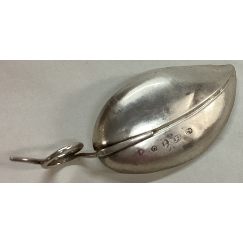 16 - A Georgian bright-cut silver caddy spoon with leaf pattern. Birmingham 1800. By Joseph Angel. Approx... 