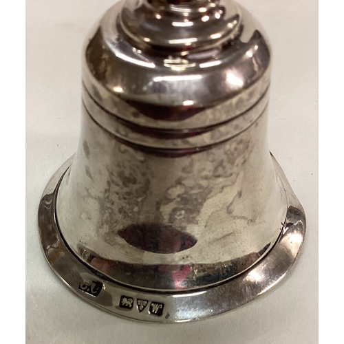 190 - CHESTER: A silver and MOP table bell. 1922. Approx. 44 grams. Est. £60 - £80.