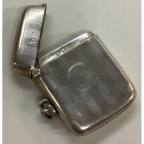 191 - An engine turned silver vesta case. Birmingham 1918. Approx. 30 grams. Est. £20 - £30.