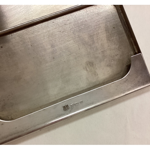 194 - A silver engine turned card holder. Birmingham 1971. By B&Co. Approx. 65 grams. Est. £80 - £120.