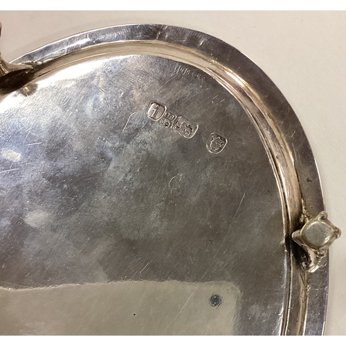 199 - An 18th Century Georgian silver teapot stand. London 1784. By John Cotton & Thomas Head. Approx. 151... 