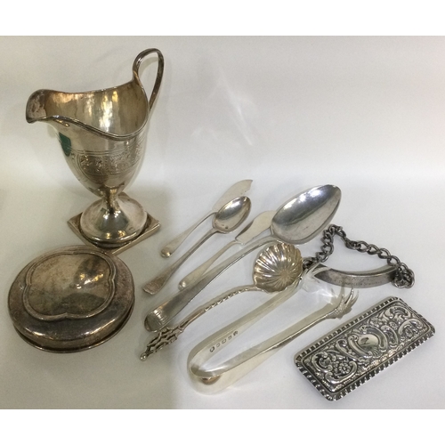 20 - A collection of silver tongs, spoons, lids etc. Approx. 219 grams of gross weight. Together with a s... 