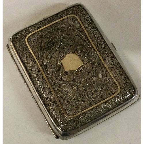 223 - A rare Chinese silver filigree cigarette case. Circa 1900. By HS. Makers mark only. Approx. 107 gram... 