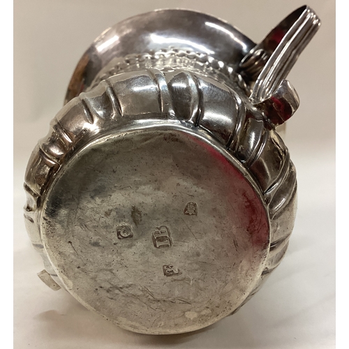 247 - A Georgian silver fluted two handled cup. London 1811. By John Bunn. Approx. 85 grams. Est. £120 - £... 