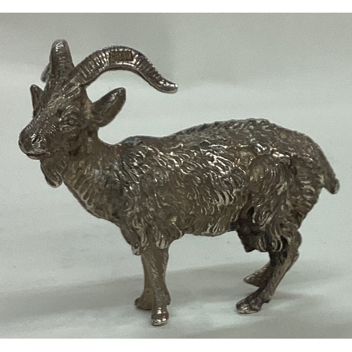 25 - An English silver figure of a goat. Import marked. Marked to antlers. Approx. 43 grams. Est. £60 - £... 