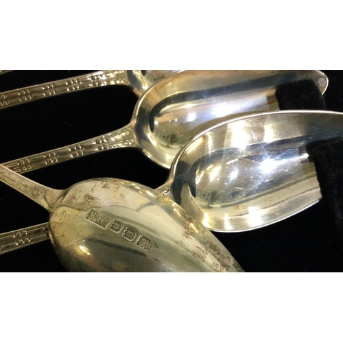 270 - A cased set of six silver grapefruit spoons. Birmingham. Approx. 104 grams. Est. £60 - £80.