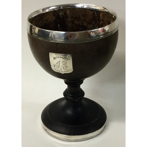 275 - An 18th Century silver mounted coconut cup. Approx. 281 grams of gross weight. Est. £300 - £500.