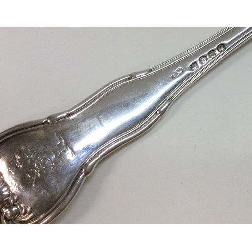 281 - PAUL STORR: A large heavy crested silver fork. Approx. 105 grams. Est. £100 - £150.