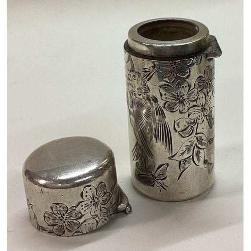 289 - SAMPSON MORDAN AND CO: A Victorian silver scent bottle engraved with owls. London 1884. Approx. 44 g... 