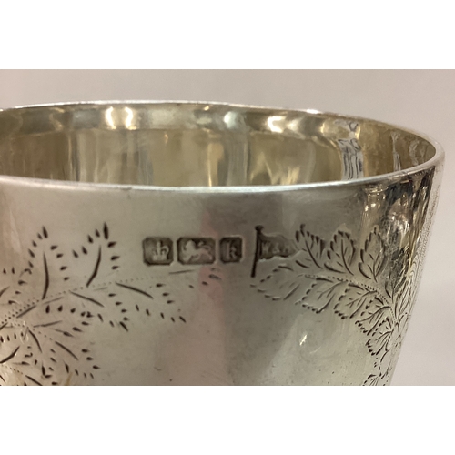 290 - A Victorian silver goblet engraved with flowers. Sheffield 1902. By Walker and Hall. Approx. Est. £1... 