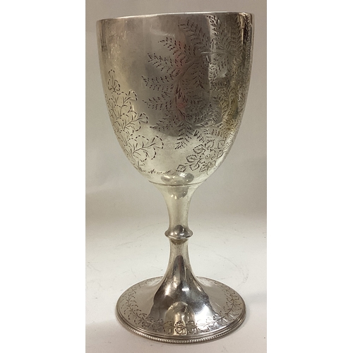 290 - A Victorian silver goblet engraved with flowers. Sheffield 1902. By Walker and Hall. Approx. Est. £1... 