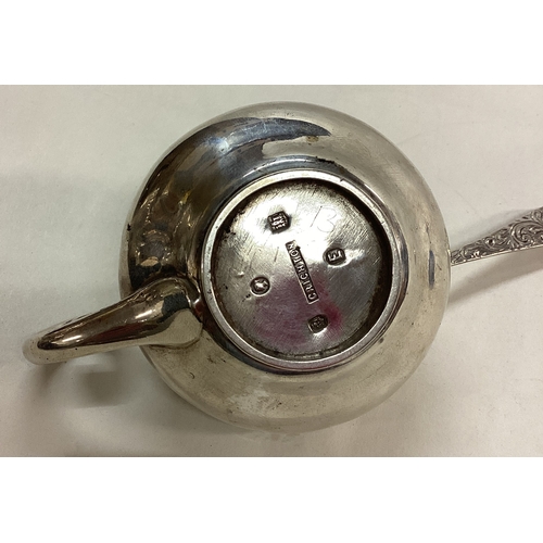 30 - EDINBURGH: A Victorian silver engraved mustard pot and spoon. 1861. By Crichton Brothers. Approx. 14... 