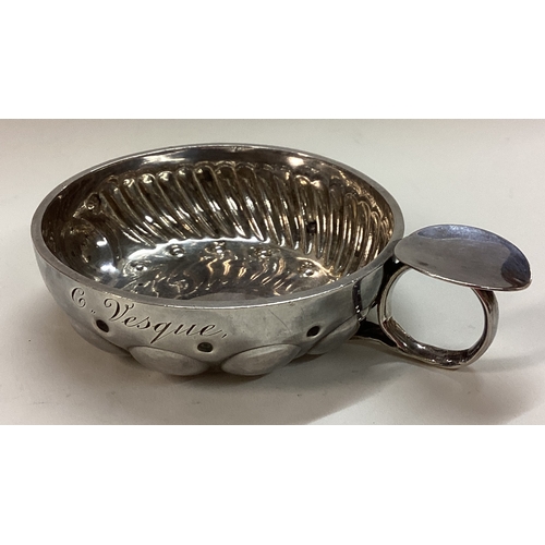 307 - A 19th Century French silver wine taster. Approx. 96 grams. Est. £100 - £150.