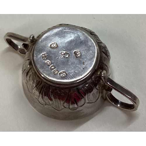 315 - An early Continental silver toy porringer. Marked to base. Approx. 17 grams. Est. £50 - £80.