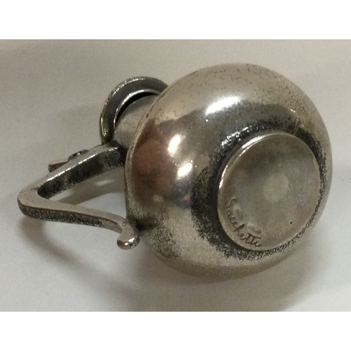 330 - A heavy silver toy coffee pot. Marked to base. Approx. 40 grams. Est. £50 - £80.