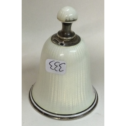 333 - A silver and enamelled table bell engraved with flowers. Marked to handle. Approx. 37 grams. Est. £1... 