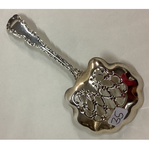 35 - An American silver ornate pierced spoon. Approx. 15 grams. Est. £20 - £30.