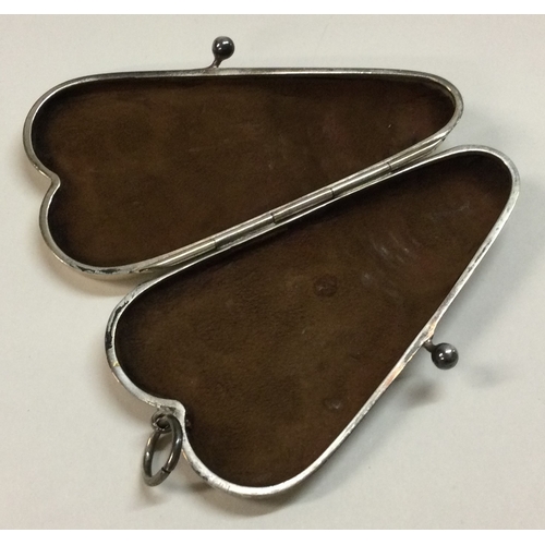 353 - CHESTER: A silver heart shaped manicure set. 1911. Approx. 34 grams. Est. £50 - £80.