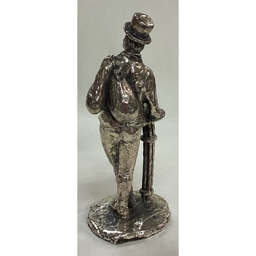 37 - A large silver plated figure of a man. Est. £20 - £30.