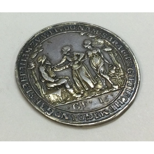 397 - A 17th Century silver medallion. Approx. 14 grams. Est. £100 - £150.