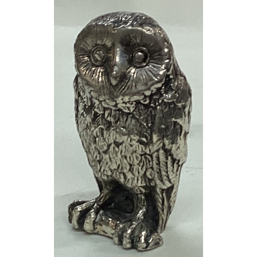 40 - A silver plated figure of an owl. Est. £20 - £30.